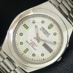 Vintage 1975 Orient Automatic Mens Silver Watch W/daydate & Green accents